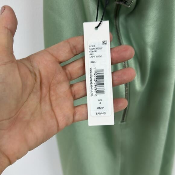 Alice + Olivia Asymmetrical Harmony Dress in Sage. - Picture 8 of 9